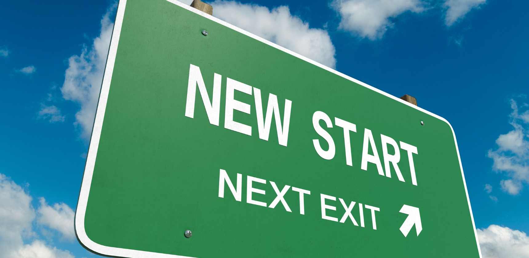 road sign showing new start