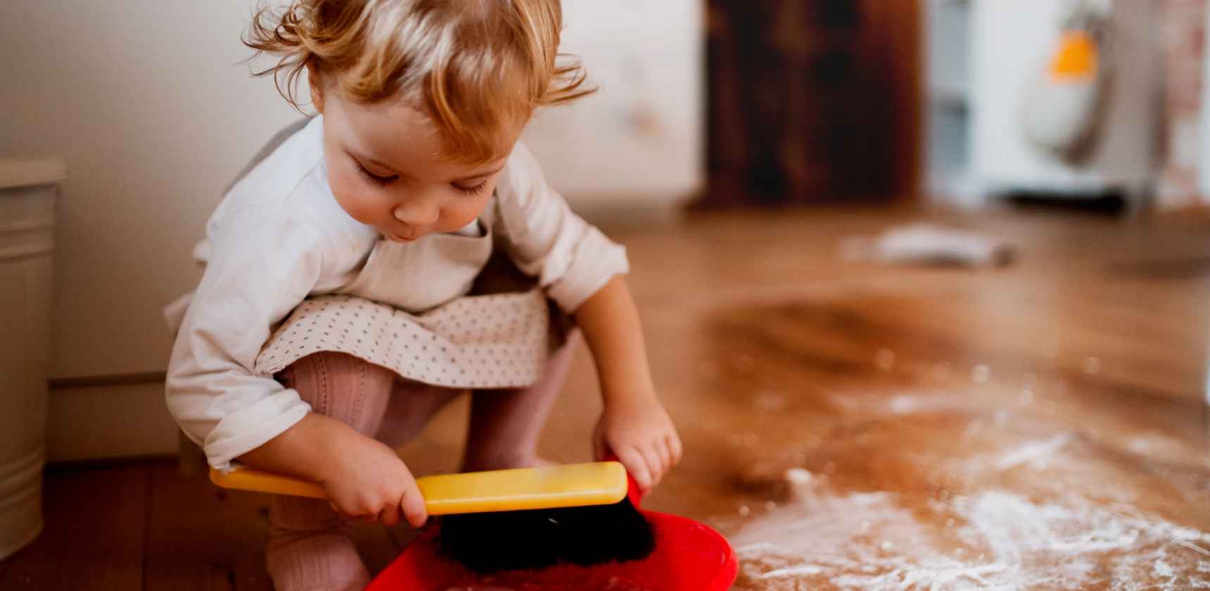 child cleaning up accident